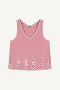 Pink tank top with floral cut-out details on a white background