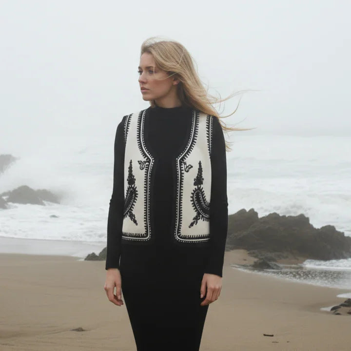 The Folk Embroidered Vest In Black and White by Ciuncanu Gheorghe styled on model, Blouse Roumaine Shop