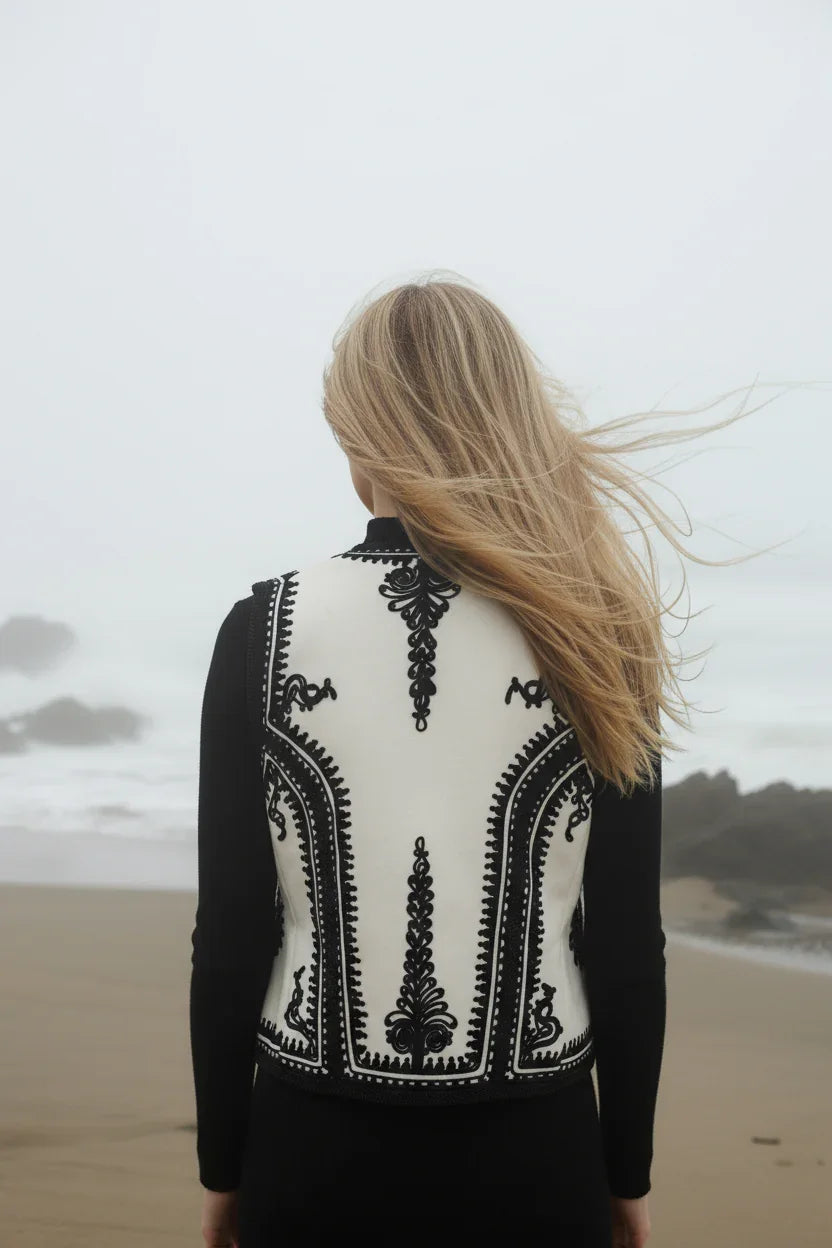 The Folk Embroidered Vest In Black and White by Ciuncanu Gheorghe, back view on model, Blouse Roumaine Shop
